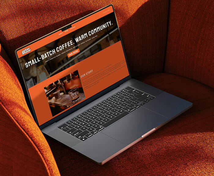 ember & bean cafe website laptop view